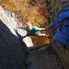 Chuck Drew working out the moves of "Stem It" 5.10d.  The route was TR'ed because it is overgrown at the moment.  