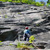 RW looks up at the "Snakeskins" (5.7) crack; 20+/- ft to its right is the crack system of "I'll Lead That" (5.8) 