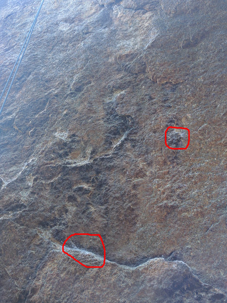 Beginning of the route. Red circles denote suggested starting handholds.