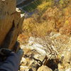 Looking down after climbing the chimney on pitch 4