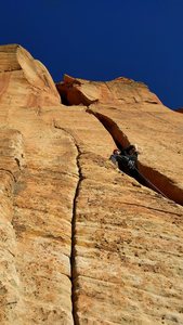Jonathan wiggling up the short but stout pitch 7