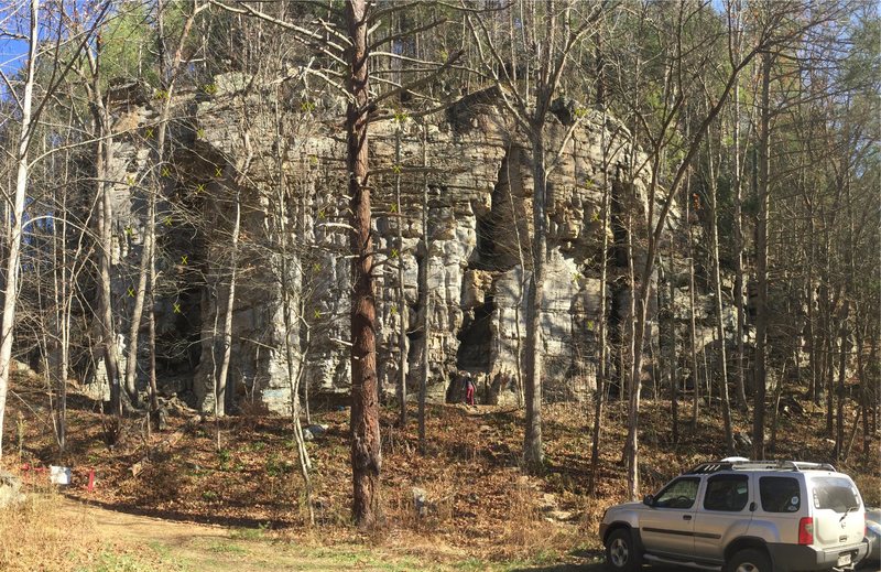 View of Parking Area Wall from parking area. Left most route is 'Limestoned'; next 'Wild, Wild, West' which at the third bolt can direct to "Route of All Evil"; right of that is "Lunar debris". So those are the three bolt lines from the left and I dont know what are the next two. Also there might be one I missed, as I dont see anything I marked that looks like 'Squeal like a Pig'