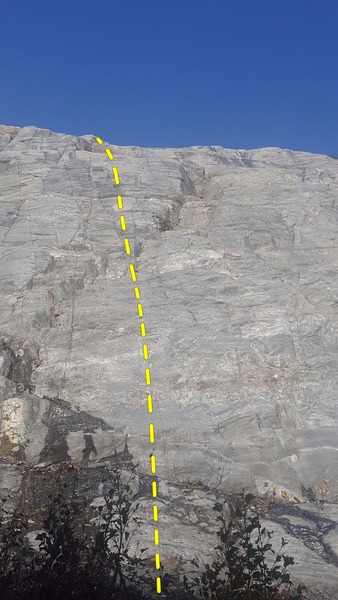 This route follows the sport line in the center of the photo.  Move left at the top to clip the anchor of pitch 1.