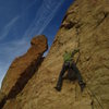 Tyler doing prep work on pitch 4.  He eventually removed the flake below his right foot with a pry bar and lots of elbow grease.