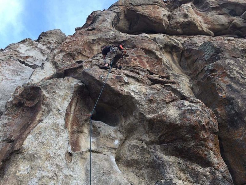 Paul Hutton above the low roof on his onsight.