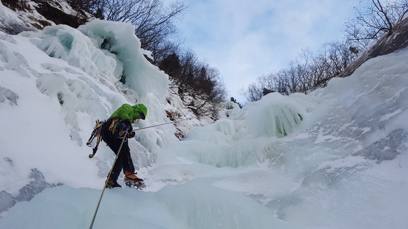 Julie nearing the base of Fang Gully with Whitewater visible on the left.