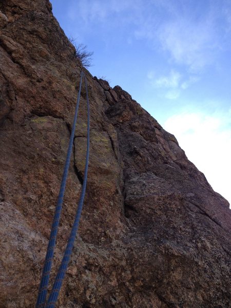 The easy gully near the top is to the right of the rope.