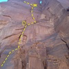 The x's show the second rappel anchors. The lower '0' shows some fixed nuts for the final rappel.  The dashed line shows the route up to pitch 2.