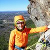 Wife at belay ledge. Next pitch continues up above her left arm. 