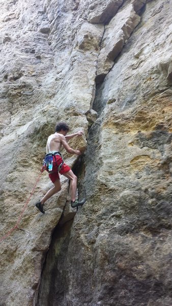 Brad on the badass burly lieback flake that comprises the first third of this route