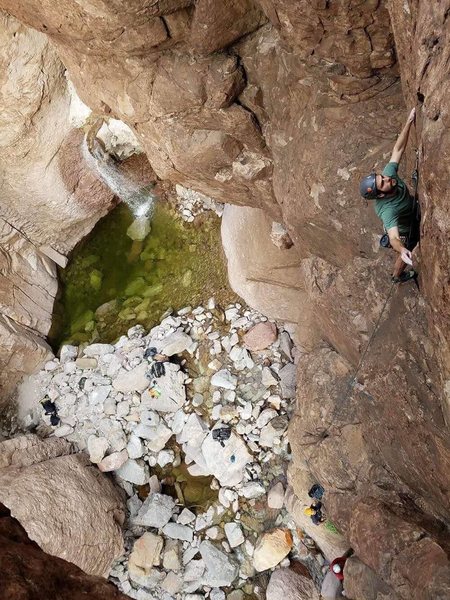 A photo taken of me on Grumpy After Eight, from the top of First Born. Atlantis filled with water.<br>
Photo cred: Kyle Kennedy