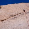 Working the 5.10d slab traverse - 2nd pitch