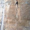 Entering the crux boulder near the end of the route