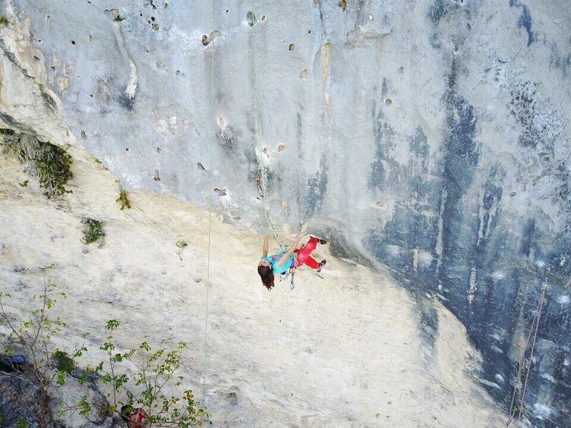 Cristina Garcia checking out the crux moves on "Existencia Dinámica" another new route bolted with titanium hardware at Caliche Crag in Ciales. Photo courtesy of AMGA Instructor Carlos Salinas.