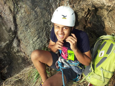 Bharath's debut into multi-pitch climbing. Prepping for leading P3, sitting on the belay ledge of P2.