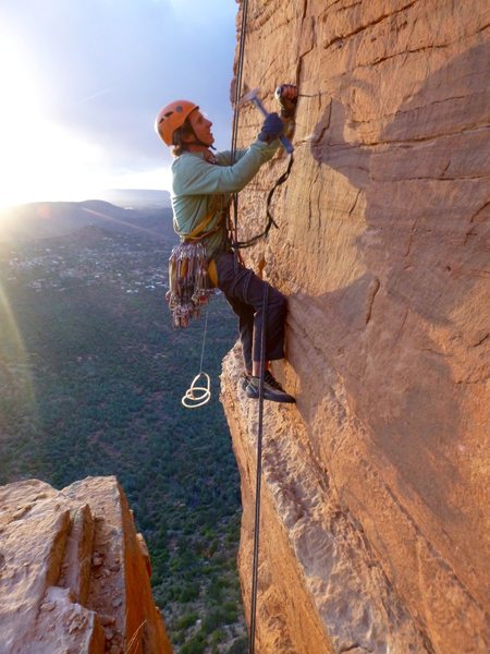 Drilling the (retro)bolt to protect the step-across on P4. Note: this was done after making the first ascent. (Photo: Dave Spies)