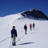 Crossing the Styggebreen Glacier, summit is to the left at top of ridge