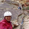 (Route Photo) WHY is this man smiling? As the wise, old climber he is: he's managed to belay, not lead, the crux pitch. (Note the all-nut trad belay.) [FA-er Larry DiAngelo on later ascent at the MtnPrjct Administrators get-together in Red Rocks]