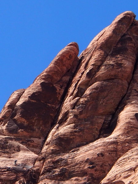 "One small climber", "one giant rock" - starting the last pitch