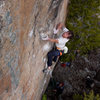 Hofer sticking the undercling at the end of the crux.