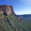 Looking south at Gibraltar Rock from the route "Pocaterra" (5.10-) on Crown Butte. It's cool watching silhouettes moving up and down the Scenic Cruise all day.