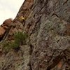 Matt Johnson on the first ascent near the crux. Stem an overlap on insecure holds for a couple of moves then cruise the rest. 