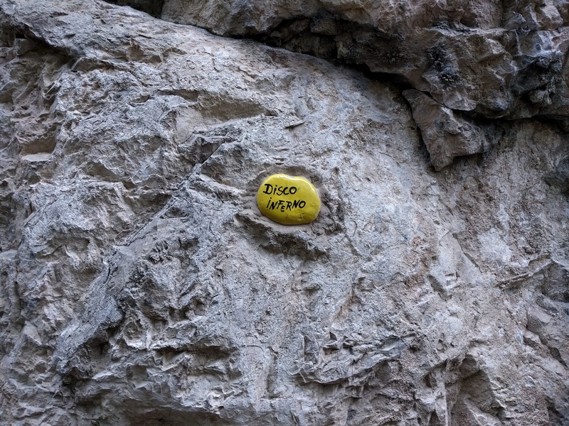 Routes at Discoteca are labeled with painted stones epoxied to the base.