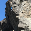 Climber on upper section of Dream Weaver.