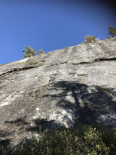 Climb the nice easy slab above a small flake at the start.