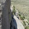 Looking right from pitch one belay at the traversing crack.