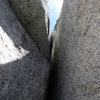 The crux of Death Flake, where the chimney/squeeze suddenly turns into an offwidth/squeeze. Time to get out the big cams!