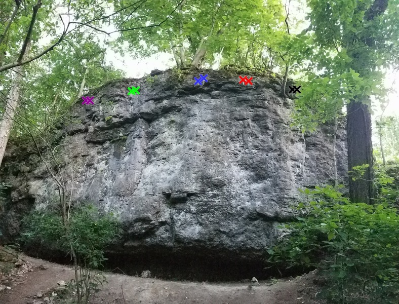 Five routes on Amusement Wall. Route on far right is Crazy Trailer Bitch. Green route towards the left is Slappy McCracken. There is also bouldering to the left on this wall (not pictured).