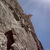 Cleaning on rappel. Beware! There is a lot for the rope to get hung up on, and the rock is quite sharp.