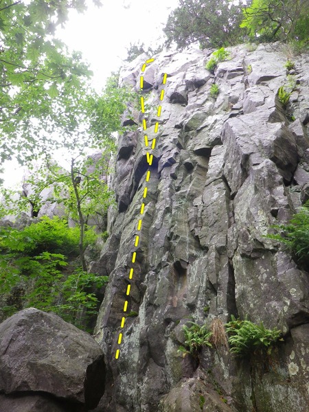 Follow line straight to the top, hand jam crack variation to the top on the left.