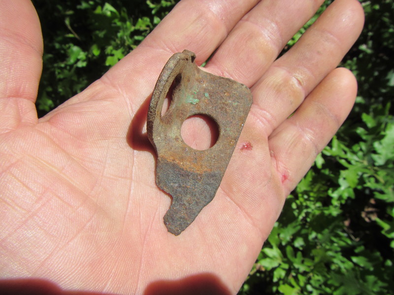 Apparently the pin placed by the Ruckmans on Trail of Tiers in 1990.  The pin had been missing since at least 2011.  Found this in 2017 in the vegetation under the route.