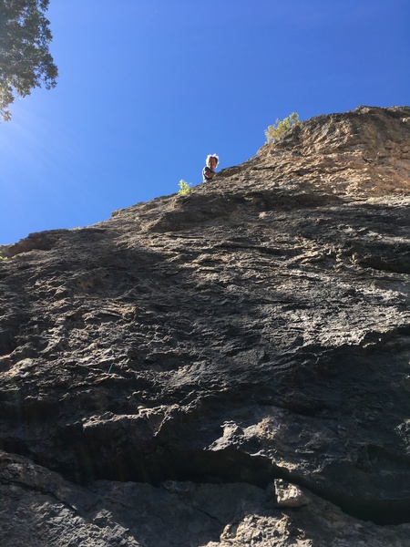 Micheal Moore peeking over the top of Original Visor 5.7 trad lead, where he established the anchors of Sweet Honey Biscuits. Many thanks!