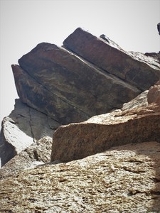 Under the jagged roof, Thai Hot following the rightmost line.