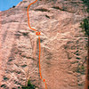 From Afar climbs face and cracks up the perfect orange patina granite on the south face of the Cobra.