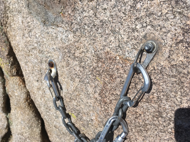 Anyone planning to use the normal rappel-from-summit bolts should either bring a crescent wrench or a bolting kit (latter solution would be best). The nut on the righthand/newer bolt was very loose, so we screwed it back on as best we could by hand. Not exactly confidence inspiring. The shiny, modern bolted anchor on the way to the normal anchor looks great but probably isn't useful for normal descent from the long routes... this original anchor should be upgraded.