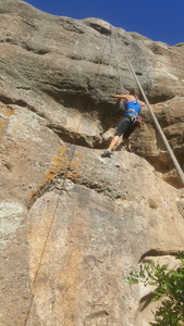 Brit working the crux on Unknown, 5.10b (aka Meat Market).