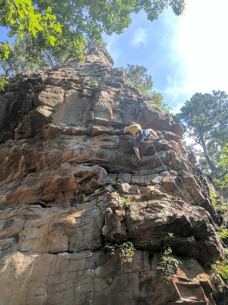 Jeff moves out onto the overhanging face of Dancing Outlaw