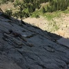 Tony approaching the belay at the top of pitch one.