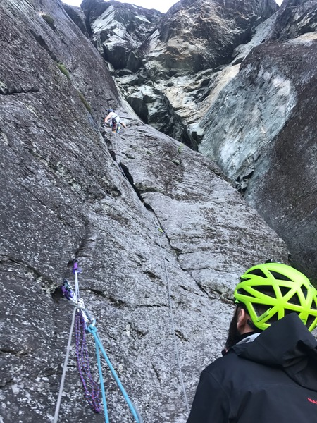 Justin leading, Brian hanging on belay in the middle of P1.