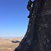 Larry DeAngelo on the crux traverse move on pitch 4.