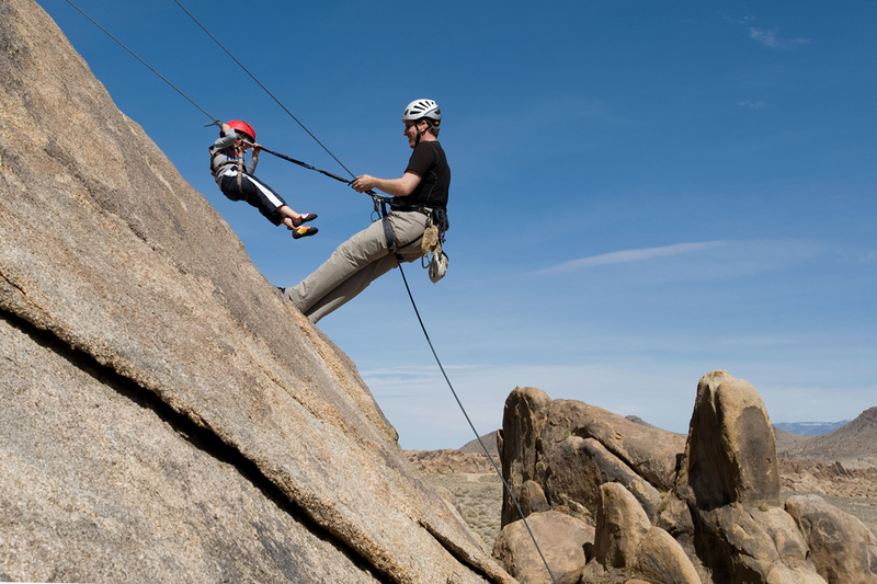 The reason for calling this technique "the Gondola" is that their reward for demonstrating perfect lowering technique on the top half of the route was to sit back and "ride" down the second half. 
<br>

<br>
When they were little, they enjoyed this even more than the actual climbing!