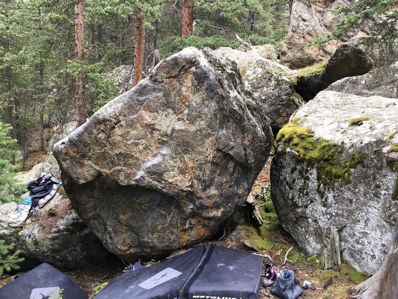 Blue Jeans and High Heels on the Lip Reader Boulder at Guanella Pass.