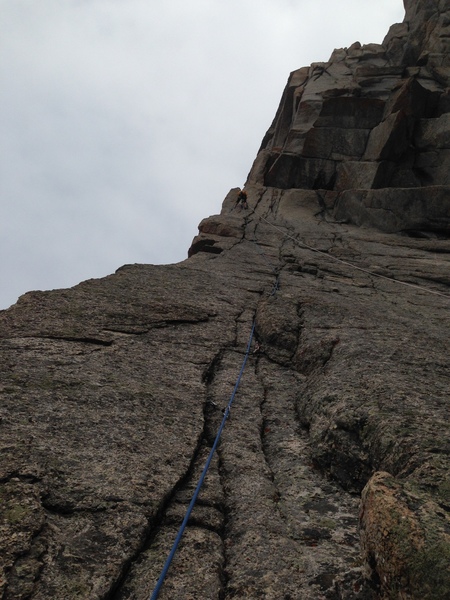 looking up from the top of P2.  The crux roof looming overhead.