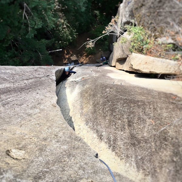 Kellie getting battered on the Battered Sandwich chimney.