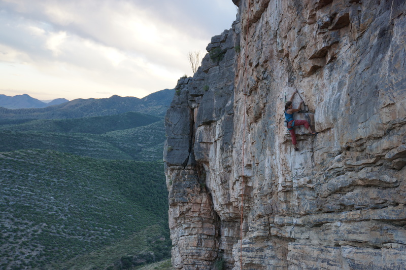 Jillian climbs the fun layback mid climb.  The crux looms above.  The climb truly has a little bit of everything.
<br>
Photo: Kemper Brightman