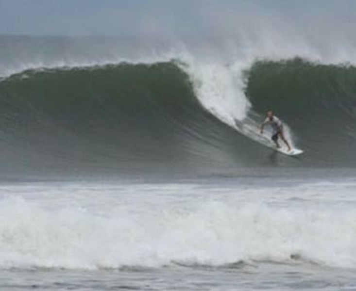 5 seconds after this I did some rock climbing only it was underwater to surface. This high tide equator has 10' tide swings. Pic later on of whats under here at low tide...Ouch!